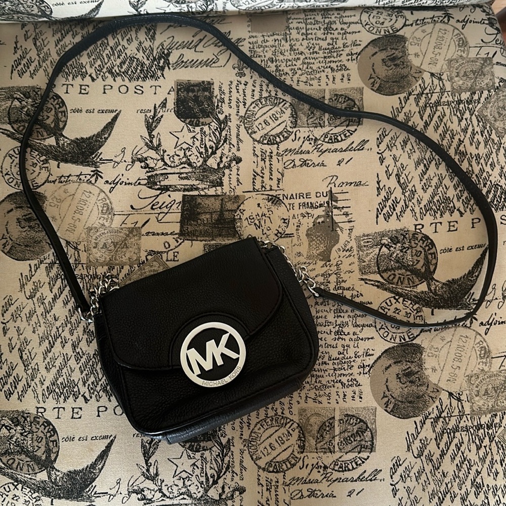 MK Saddle purse